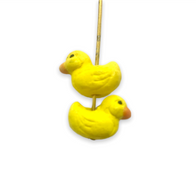 Load image into Gallery viewer, Tiny yellow rubber duck beads Peruvian ceramic 4pc 12x7mm