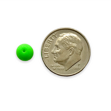 Load image into Gallery viewer, Czech glass round beads 40pc matte neon green UV glow 6mm