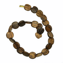 Load image into Gallery viewer, Notched coconut palm wood striped natural coin beads 25pc 19-22mm 16" strand-Orange Grove Beads
