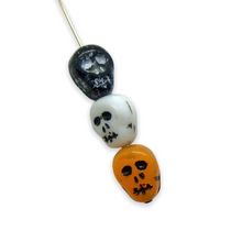 Load image into Gallery viewer, Czech glass skull beads 12pcs Halloween colors mix orange black white