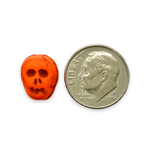 Load image into Gallery viewer, Czech glass skull beads 8pc UV neon orange 12mm