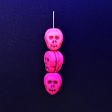 Load image into Gallery viewer, Czech glass skull beads 8pc UV neon pink 12mm