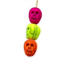 Load image into Gallery viewer, Czech glass skull beads 8pc UV neon rainbow mix 12mm