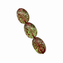 Load image into Gallery viewer, Czech glass twisted oval beads 16pc light green pink paisley