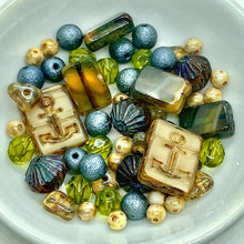 Load image into Gallery viewer, Czech glass coastal bead mix with anchors in blues greens browns 58pc
