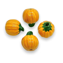 Load image into Gallery viewer, Tiny Halloween pumpkin beads Peruvian ceramic 4pc 10mm
