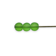 Load image into Gallery viewer, Czech glass round druk beads 100pc translucent frosted green 5mm
