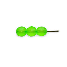 Load image into Gallery viewer, Czech glass faceted round beads 25pc matte neon green UV 6mm
