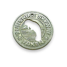 Load image into Gallery viewer, Sunshine Skyway bridge silver tone token manatee cutout Tampa Bay Florida pendant 1pc
