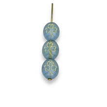 Load image into Gallery viewer, Czech glass oval St Patrick&#39;s Irish shamrock clover beads 25pc frosted blue gold 10x8mm
