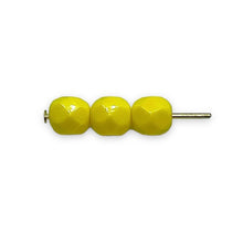 Load image into Gallery viewer, Czech glass faceted round beads 25pc opaque yellow 6mm
