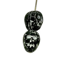 Load image into Gallery viewer, Czech glass skull beads 8pc matte black white patina 12mm
