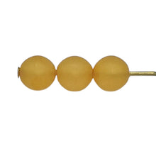 Load image into Gallery viewer, Czech glass round druk beads 50pc matte yellow orange 6mm
