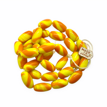 Load image into Gallery viewer, Wrapped Halloween candy glass beads 8pc orange yellow stripes
