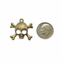 Load image into Gallery viewer, Pirate skull and crossbones charm pendant 2pc gold tone lead free pewter 24x22mm USA made

