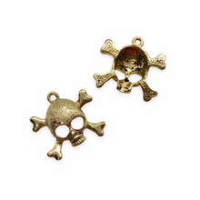 Load image into Gallery viewer, Pirate skull and crossbones charm pendant 2pc gold tone lead free pewter 24x22mm USA made-Orange Grove Beads
