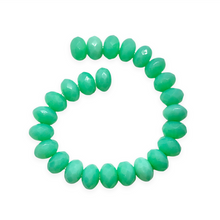 Load image into Gallery viewer, Czech glass faceted rondelle beads 25pc blue green opaline UV glow 9x6mm
