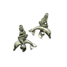 Load image into Gallery viewer, Mermaid riding dolphin charm pendant 2pc silver tone pewter 27mm
