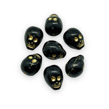 Load image into Gallery viewer, Czech glass double sided skull beads 8pc black gold 13x10mm-Orange grove beads
