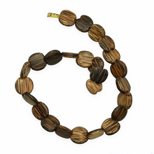 Load image into Gallery viewer, Notched coconut palm wood striped natural coin beads 25pc 19-22mm 16&quot; strand-Orange Grove Beads
