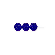 Load image into Gallery viewer, Czech glass tiny daisy flower beads 50pc translucent blue 6mm

