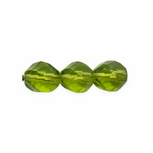 Load image into Gallery viewer, Czech glass faceted helix twisted round beads 20pc translucent olivine green 8mm
