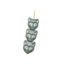 Load image into Gallery viewer, Czech glass cat head face beads 10pc light blue gray silver 13x11mm
