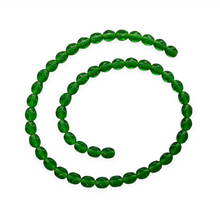 Load image into Gallery viewer, Czech glass small oval diamond beads 50pc translucent green 7x6mm-Orange Grove Beads
