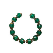 Load image into Gallery viewer, Czech glass faceted twisted turbine beads 12pc emerald green bronze 10x8mm-Orange Grove Beads
