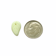 Load image into Gallery viewer, Czech glass flat leaf charms beads 20pc opaque pale yellow 14x9mm UV reactive

