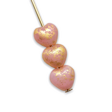 Load image into Gallery viewer, Czech glass tiny heart beads 50pc pink gold rain 6mm
