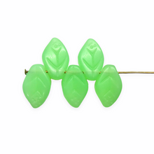 Load image into Gallery viewer, Czech glass leaf beads 25pc UV glow opaline green 12x8mm
