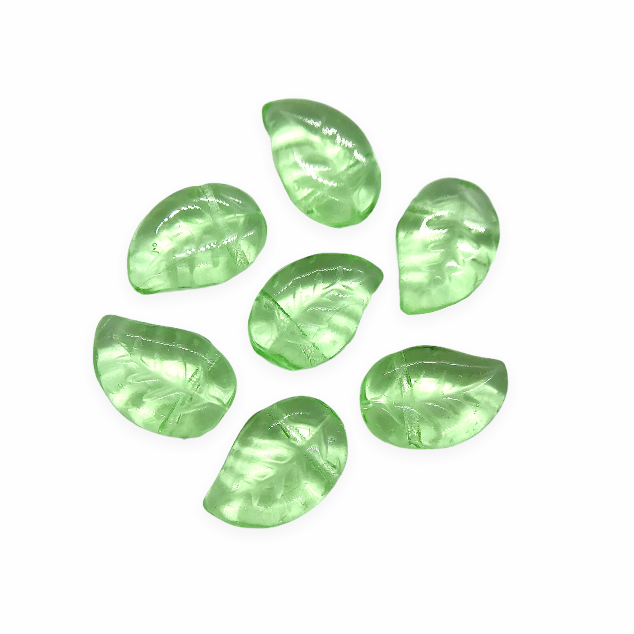 Czech glass leaf beads 25pc translucent light peridot green 12x7mm – Orange  Grove Beads