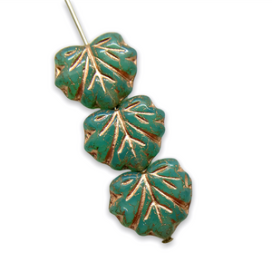 Czech glass maple leaf beads 12pcs sea green opaline copper UV glow 13x11mm