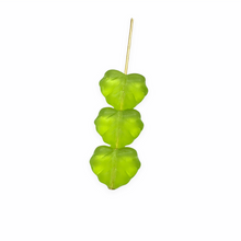 Load image into Gallery viewer, Czech glass maple leaf beads 12pc translucent matte olivine green 13x11mm
