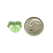 Load image into Gallery viewer, Czech glass maple leaf beads 12pc translucent light green 13x11mm
