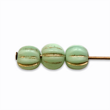 Load image into Gallery viewer, Czech glass melon beads 25pcs mint green gold 5mm-Orange Grove Beads
