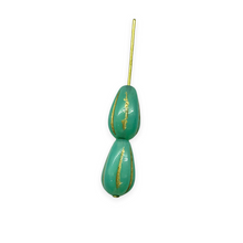 Load image into Gallery viewer, Czech glass melon drop beads 10pc turquoise gold 13x8mm UV glow
