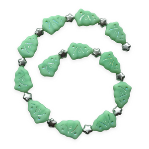 Czech glass Christmas bead mix 24pc with mint green trees and silver stars UV glow-Orange Grove Beads