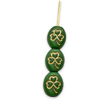 Load image into Gallery viewer, Czech glass oval St Patrick&#39;s Irish shamrock clover beads 25pc green gold 10x8mm
