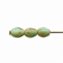 Load image into Gallery viewer, Czech glass pinch beads 40pc mint green gold rain 5x3mm-Orange Grove Beads
