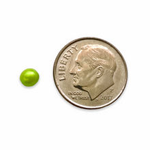 Load image into Gallery viewer, Czech glass round druk beads 100pc lime green pearl 4mm UV glow
