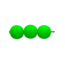 Load image into Gallery viewer, Czech glass round beads 25pc matte neon green UV glow 8mm-Orange Grove Beads
