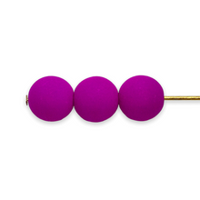 Load image into Gallery viewer, Czech glass round beads 25pc matte neon purple pink UV glow 8mm-Orange Grove Beads
