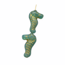 Load image into Gallery viewer, Czech glass seahorse focal beads 4pc opaline blue gold decor 28mm
