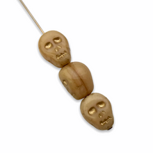Load image into Gallery viewer, Czech glass skull beads 8pc ivory beige gold inlay 12mm
