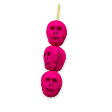 Load image into Gallery viewer, Czech glass skull beads 8pc UV neon pink 12mm
