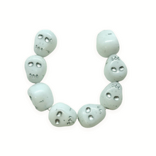 Load image into Gallery viewer, Czech glass skull beads 8pc white silver inlay 12mm
