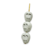 Load image into Gallery viewer, Czech glass skull beads 8pc white silver inlay 12mm
