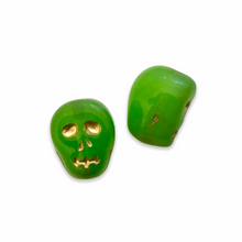 Load image into Gallery viewer, Czech glass Halloween skull beads 8pc green opal gold 12mm
